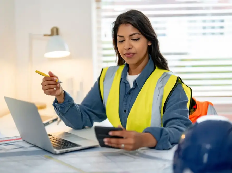 A female construction manager working on her taxes