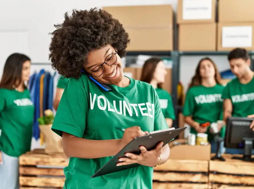 a group of volunteers working together in the community